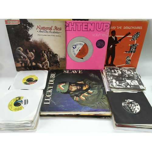 103 - A box of reggae, ska and 2 Tone LPs and 7inch singles including some Jamaican pressings.