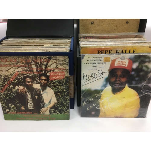 104 - Two record cases of African LPs.