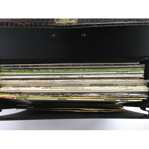 105 - A record case of world music LPs and 10inch records.