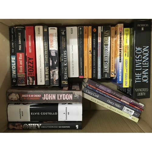 1086 - Two boxes of mainly music autobiographies and DVDs.