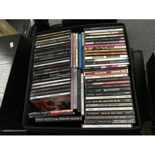 1088 - A large collection of CDs by various artists including Foo Fighters, Smashing Pumpkins, Motley Crue,... 