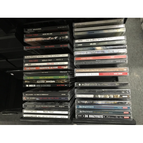 1089 - A large collection of CDs by various artists including Green Day, Ween, Avenged Sevenfold, American ... 