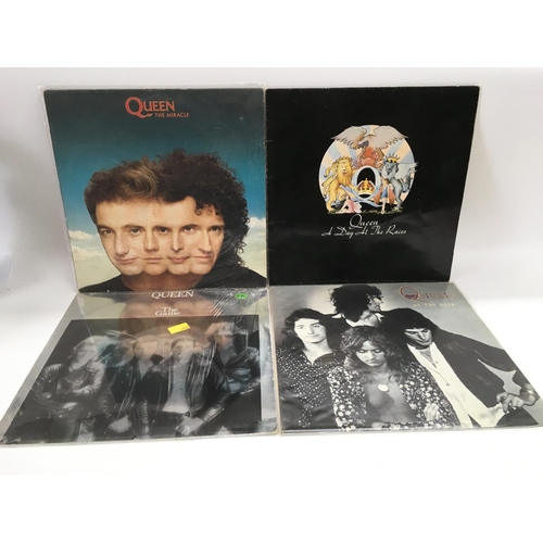 115 - Four Queen LPs comprising 'A Day At The Races', 'The Miracle', 'The Game' and 'At The Beeb'.