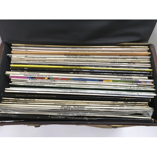 127 - A record case of 7inch singles and EPs by various artists from the 1960s onwards together with a rec... 