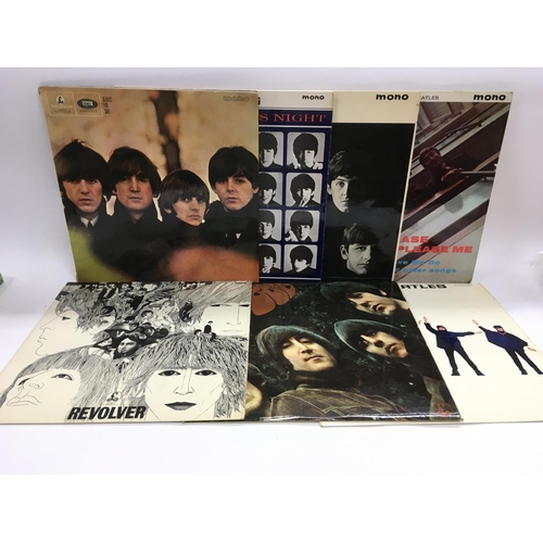 130 - Seven early UK issue Beatles LPs including 'Revolver', 'Rubber Soul', 'Please Please Me' and others.