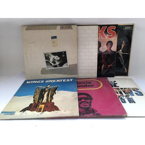 156 - A collection in two bags of 1960s and later rock LPs by various artists including The Kinks, Pink Fl... 