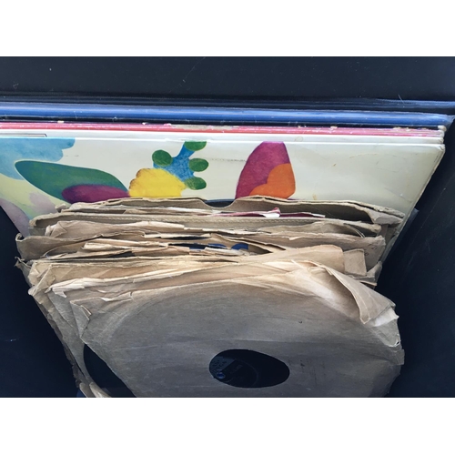 179 - A record case containing a collection of mainly rock n roll and skiffle 78s plus some LPs by various... 