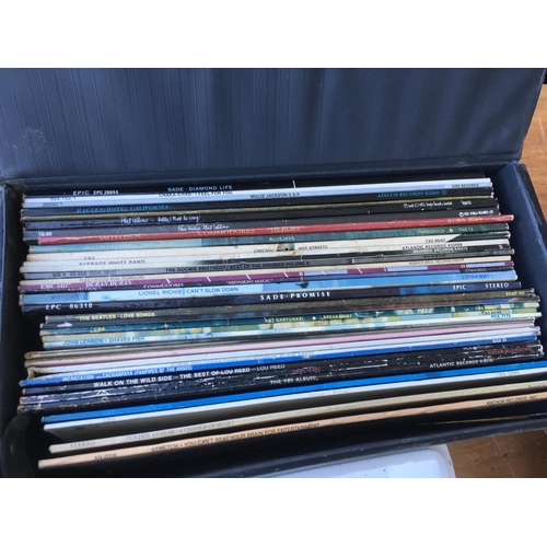 180 - Two record cases of LPs by various artists including The Jam, Santana, Jimi Hendrix and others.