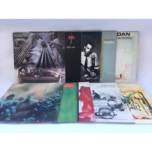 183 - Nine Steely Dan LPs including 'Pretzel Logic', 'Katy Lied', 'Aja' and others.