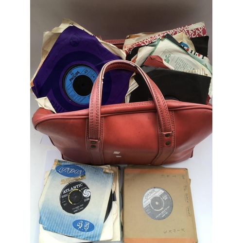 202 - Two holdalls of 7inch singles by various artists from the 1960s onwards.