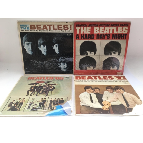 204 - Four early US pressings of Beatles LPs comprising a Scranton pressing of 'Meet The Beatles', 'A Hard... 