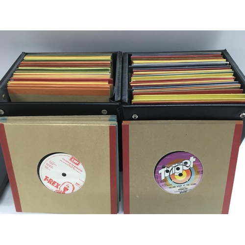 21 - Four record cases of 7inch singles by various rock, pop, Motown and reggae artists.