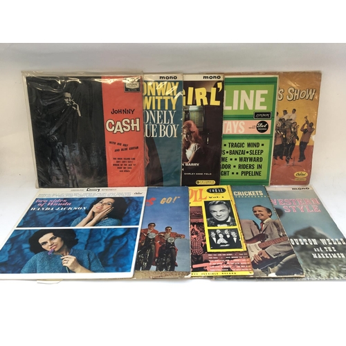 249 - A record case containing a collection of rock n roll and country LPs by various artists including Jo... 