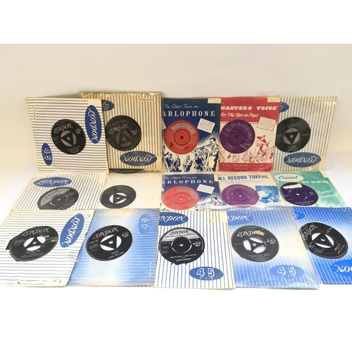 265 - A record case of rock n roll 7inch singles by various artists including Elvis Presley, Little Richar... 