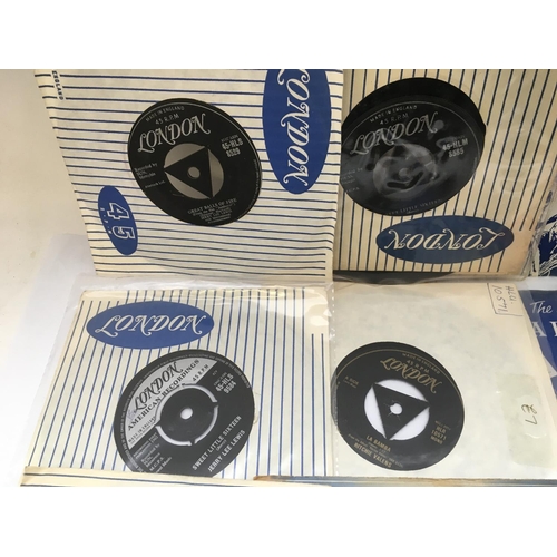 265 - A record case of rock n roll 7inch singles by various artists including Elvis Presley, Little Richar... 