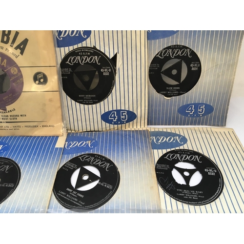 265 - A record case of rock n roll 7inch singles by various artists including Elvis Presley, Little Richar... 