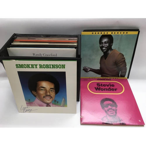 27 - A record case of LPs and 12inch singles by various reggae, soul and disco artists including Prince, ... 