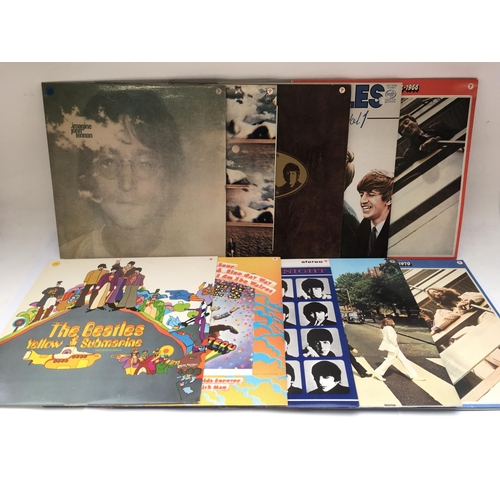 292 - Ten Beatles and solo LPs comprising 'Abbey Road', 'Yellow Submarine', 'A Hard Day's Night' and other... 