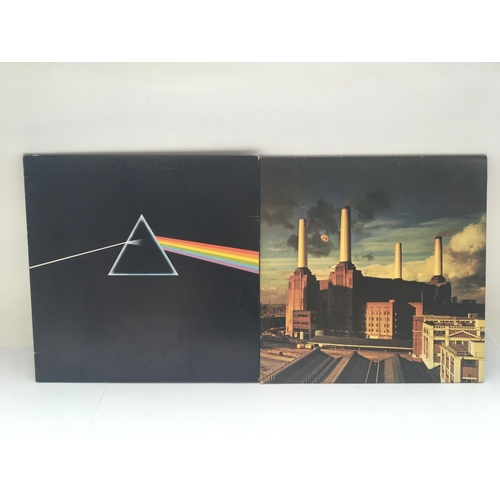 294 - Two Pink Floyd LPs comprising Animals and Dark Side Of The Moon complete with all inserts. Both Ex.