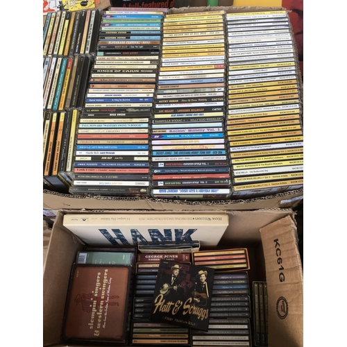 309 - Two boxes of country music CDs including box sets.