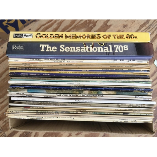 320 - A box of LPs and 12inch singles by various artists including Queen, Steve Howe, Elvis Presley and ot... 