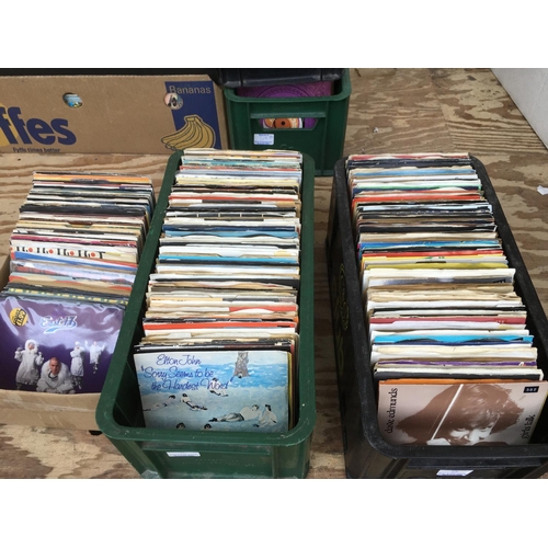 322 - Three small boxes of over 400 7inch singles by various artists.