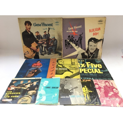 351 - A collection in two bags of rock n roll and skiffle LPs and EPs by various artists including Gene Vi... 