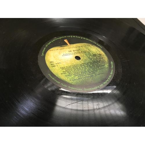 6 - An early numbered Beatles 'White Album', number 0000894, complete with black inner sleeves, poster a... 