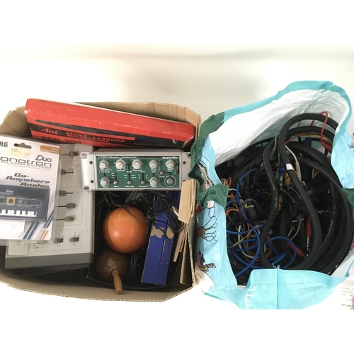 780 - A box of musical equipment comprising an Electrix vintage stereo filter, percussion instruments and ... 