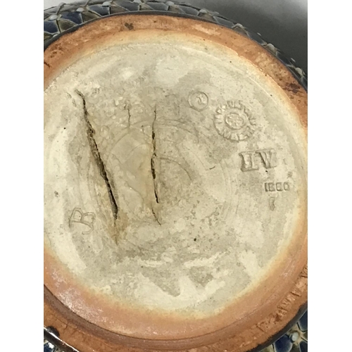 1084 - A Lambeth Doulton jug, damaged