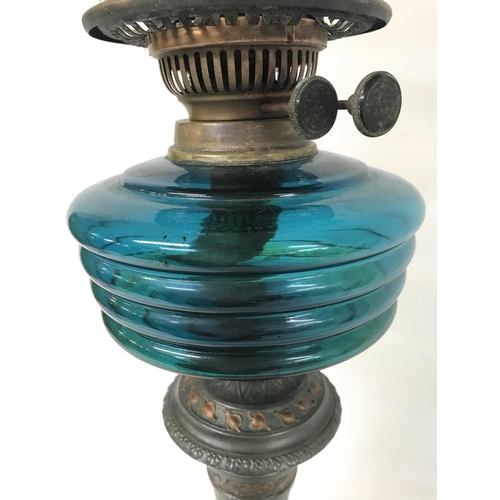 1108 - Victorian oil lamp with unusual base, blue glass reservoire and heavy cut glass shade