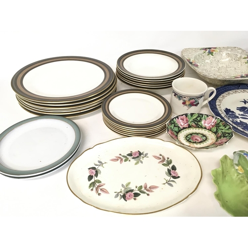 1151 - A collection of assorted plates and dishes including Wedgwood and w Royal Doulton etc.