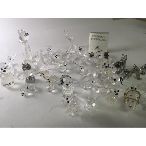 1169 - A collection of Swarovski Crystal and other animal ornaments (no boxes)