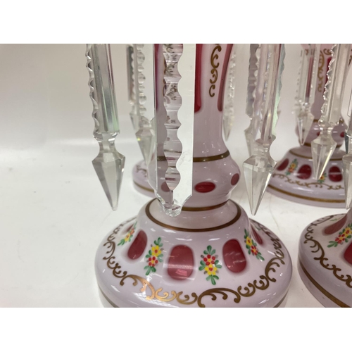 1188 - Victorian Lustres with floral designs, some missing & damaged crystals. Approximately 25cm tall