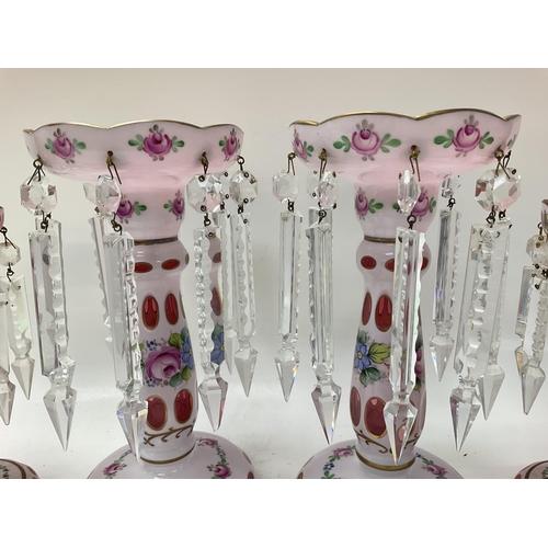 1189 - Victorian Lustres with floral designs, approximately 21cm & 25.5cm tall