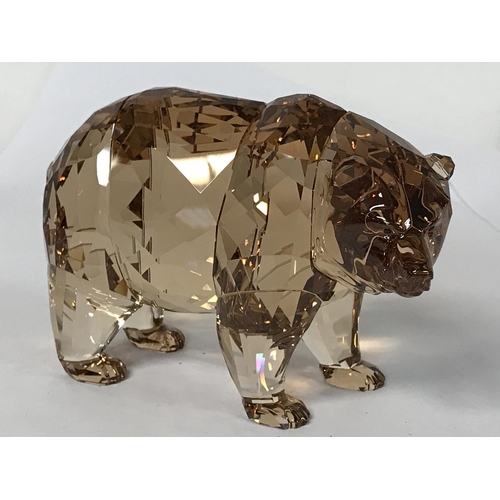 1200 - Three boxed Swarovski pieces including Arcadia Brown bear, Orca and Rose Blossom