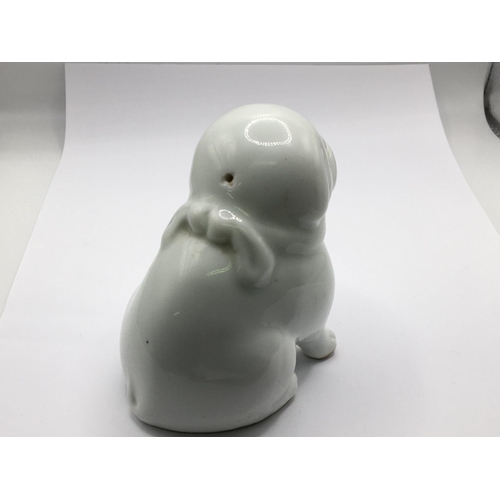 1234 - A JAPANESE HIRADO PUG DOG WATER DROPPER 19TH CENTURY Modelled as a small pug seated on his haunches ... 