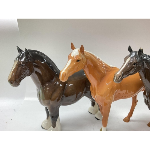 1261 - Three Beswick horse, 26cm high