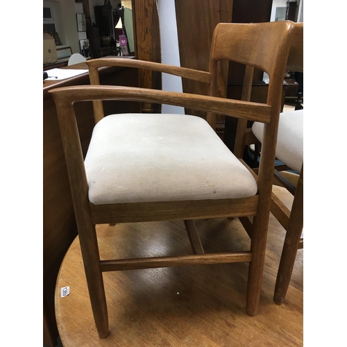 1369 - A 1970s circular dining table together with 6 dining chairs.