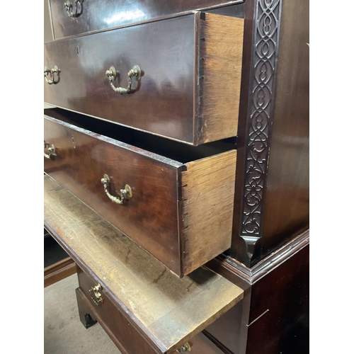 1432 - A George III mahogany chest on chest with blind fret work detailing to edges and Greek key design to... 