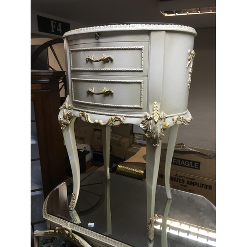 1452 - A pair of white bedside cabinets with giltwork decoration.