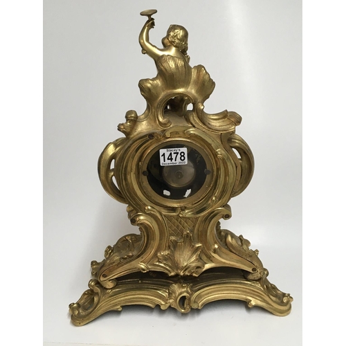 1478 - An impressive gilt bronze rococo style clock with cherub decoration. 48cm