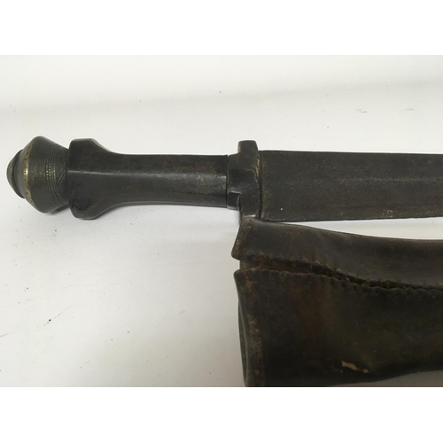 1608 - An unusual Antique Abyssinian Ethiopian short sword with a brass pommel horn grip with a curved stee... 