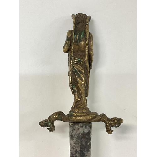 1644 - Romantic/Ritual dagger and scabbard brass grip in the shape of the horned Devil, holding a dagger on... 