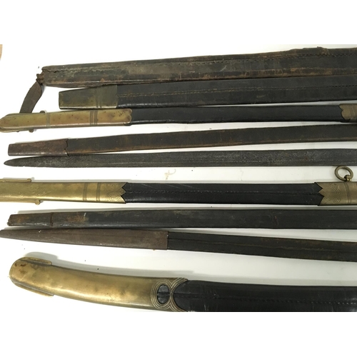 1653 - Various sword scabbards and an old sword blade