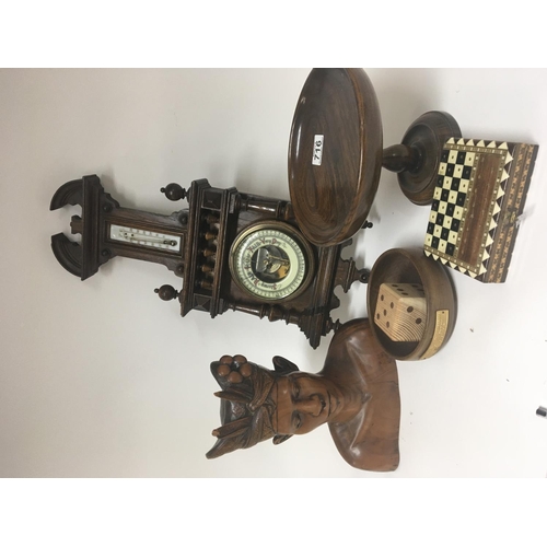 820 - A carved hard Wood Indonesian bust a barometer and other treen (a lot)