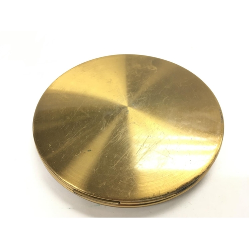 846 - A vogue compact mirror. Approximately 4inch circumference.