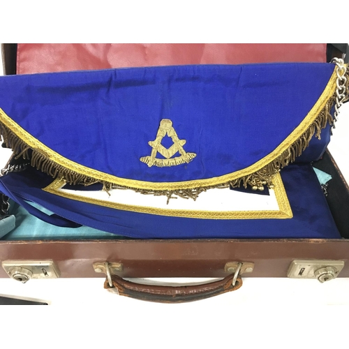 853 - A collection of Masonic items including cufflinks and items of dress.