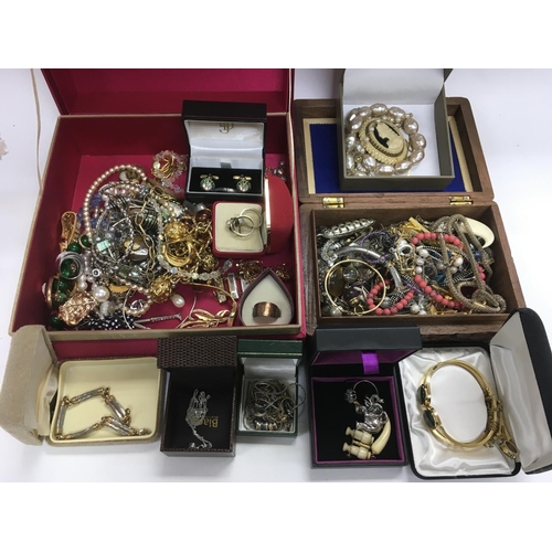 859 - Two boxes of costume jewellery.
