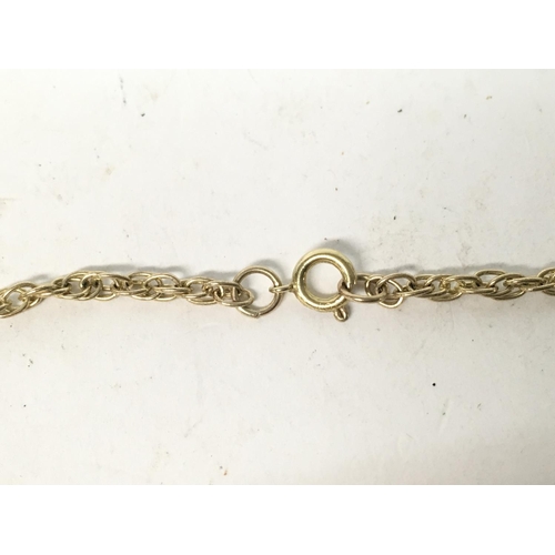 867 - 9ct gold ingot on chain. Total weight 37.56g